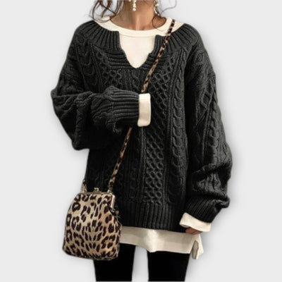 Oversized knitted sweater with cable pattern